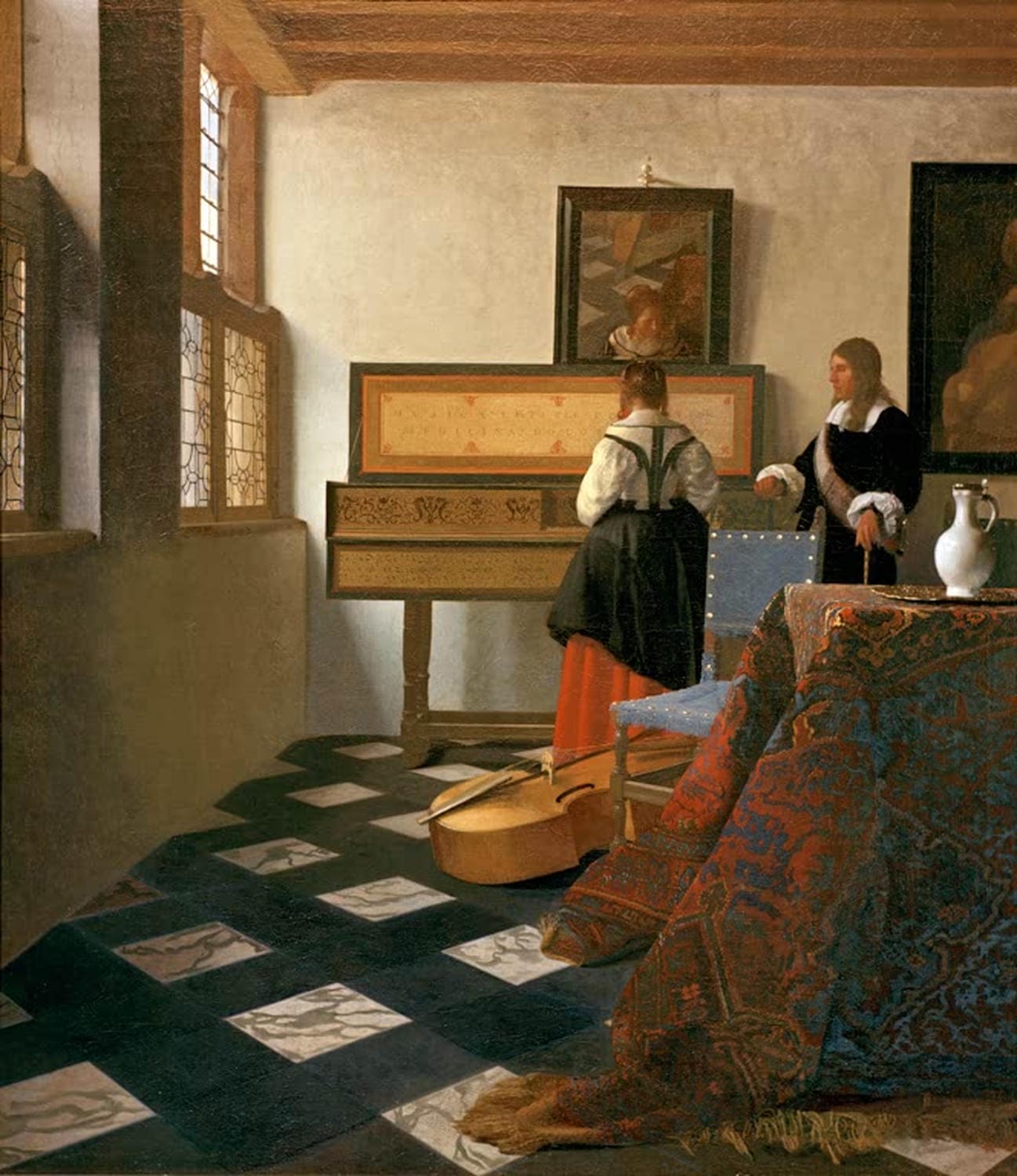 Gemälde „Die Musikstunde“ von Johannes Vermeer mit Frau am Virginal und Herr im Innenraum