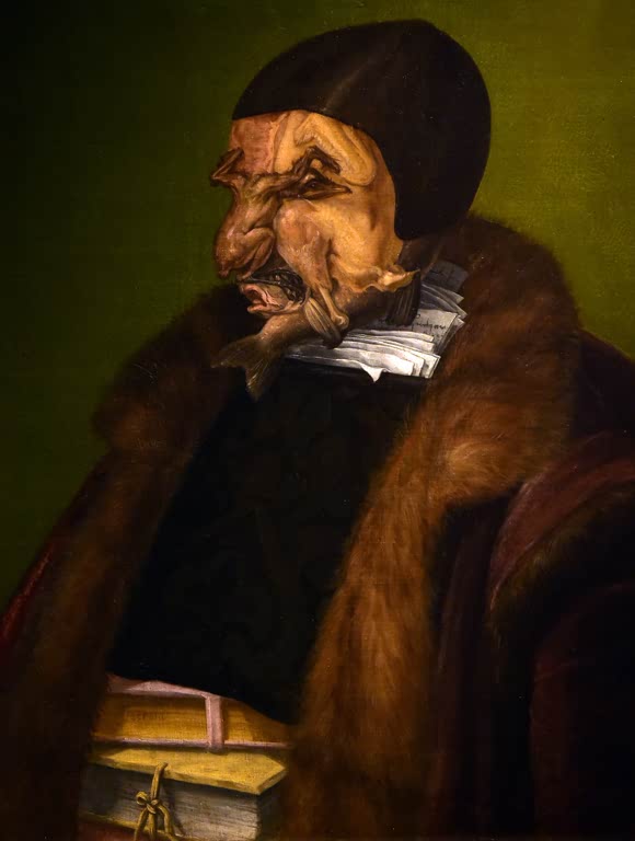 Kunstdruck „Der Jurist“ von Giuseppe Arcimboldo mit einem aus Büchern, Dokumenten und Fleischformen zusammengesetzten Porträt
