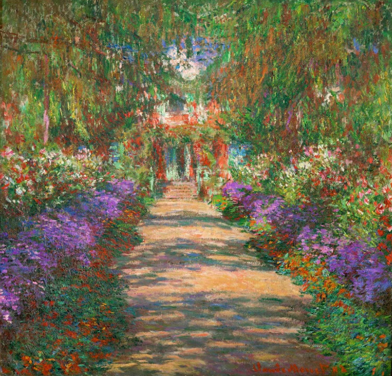 Eine Allee in Monets Garten in Giverny_Claude Monet als Kunstdruck mit lila und roten Blumen