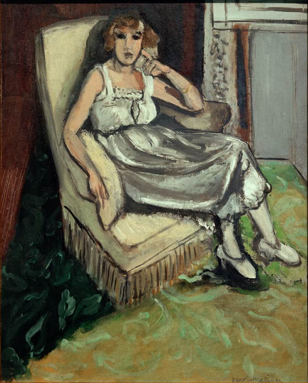 Kunstdruck des Gemäldes „Frau im Lehnstuhl“ von Henri Matisse, erhältlich als Poster oder Leinwand, optional gerahmt, in Deutschland von Hand gefertigt.