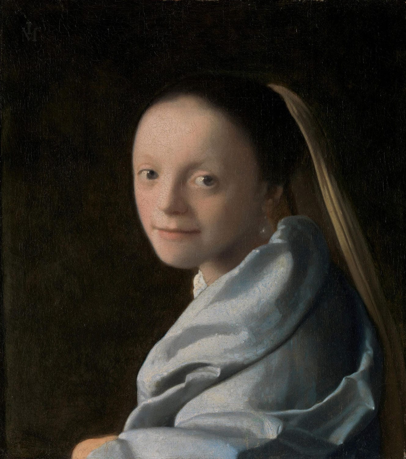 Studie einer jungen Frau, gemalt von Johannes Vermeer, zeigt eine nachdenklich blickende Frau in sanften Blau-, Gelb- und Brauntönen, mit meisterhaftem Licht-Schatten-Spiel, das ihre Ruhe und Eleganz betont.