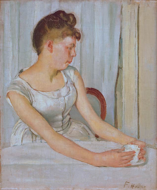 Bertha Stucki assise à une table