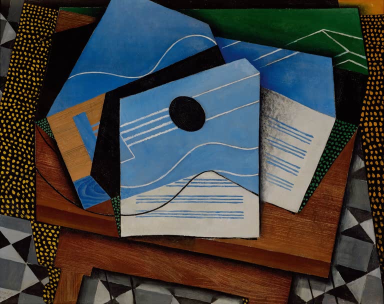 Guitare sur une table