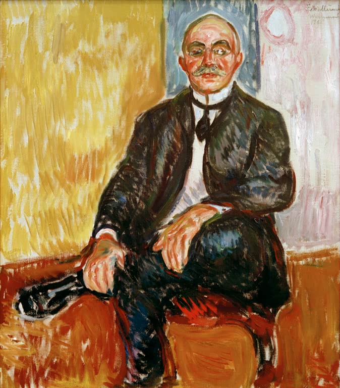 Älterer Mann im dunklen Anzug sitzt im Sessel vor gelber Wand – Edvard Munch Gustav Schiefler Kunstkopie