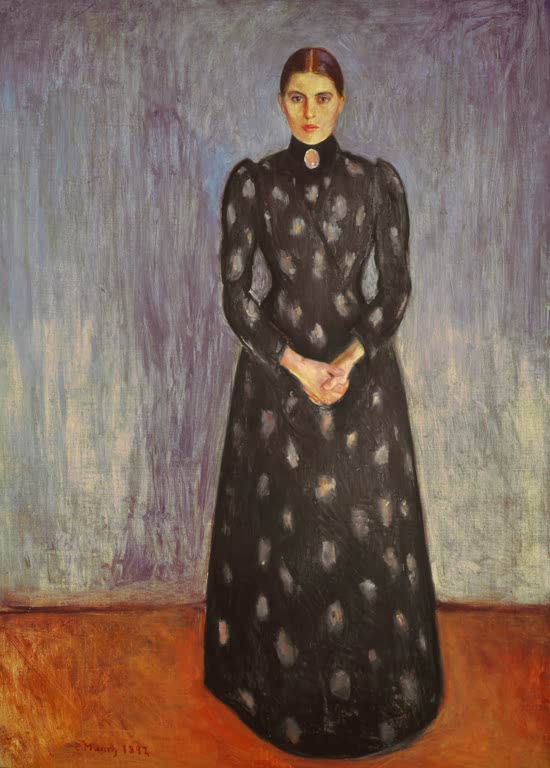 Stehende Frau in schwarzem Kleid mit hellen Tupfen vor violettem Hintergrund – Edvard Munch Inger Kunstkopie