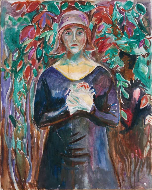 Frau mit rosa Hut und dunklem Kleid steht vor rot und türkis leuchtendem Laub – Edvard Munch Modell im Garten Kunstkopie