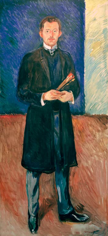 Stehender Mann im dunklen Mantel mit Pinseln in der Hand vor blauer Wand – Edvard Munch Selbstbildnis mit Pinseln Kunstkopie