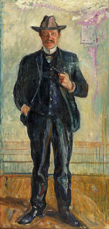Stehender Mann mit Hut und Pfeife in dunklem Anzug vor heller Wand – Edvard Munch Torvald Stang Kunstkopie
