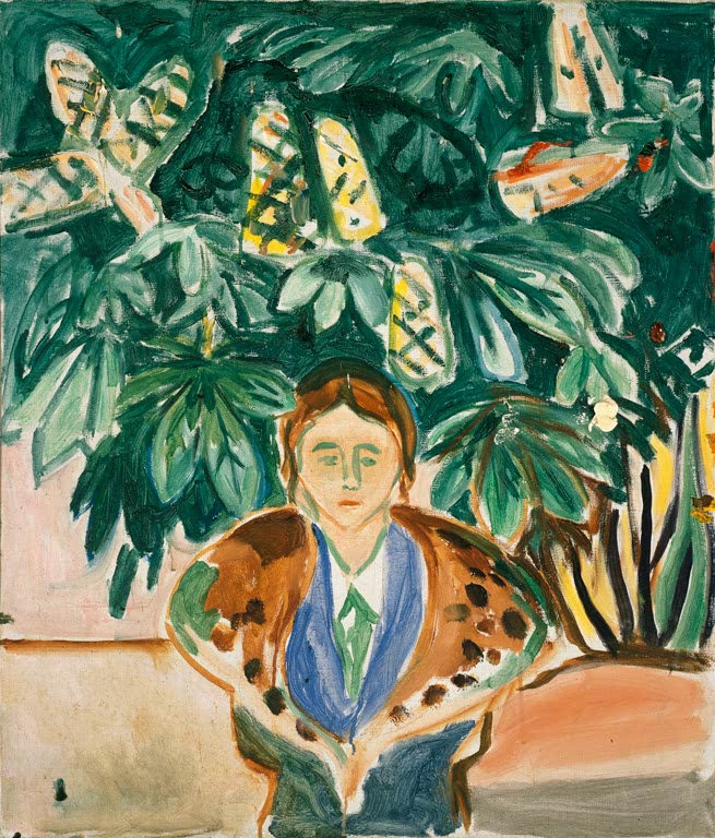 Junge Frau sitzt vor dichtem grünem Laub und blühenden Kastanienkerzen – Edvard Munch Unter der Kastanie Kunstkopie