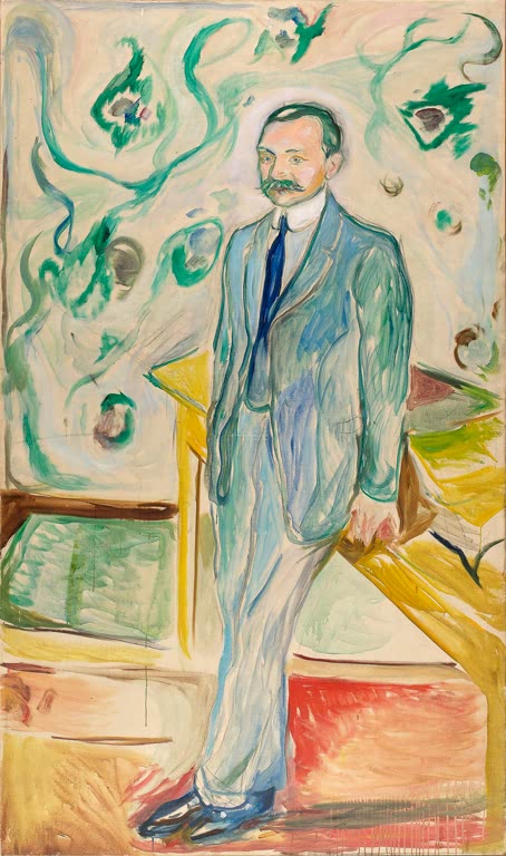 Mann im hellblauen Anzug steht an einem Tisch vor gemusterter Wand – Edvard Munch Wilhelm Wartmann Kunstkopie