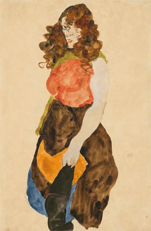 Junge Frau mit lockigem braunem Haar in buntem Kleid mit orangefarbenem Oberteil – Egon Schiele Dirne Kunstkopie