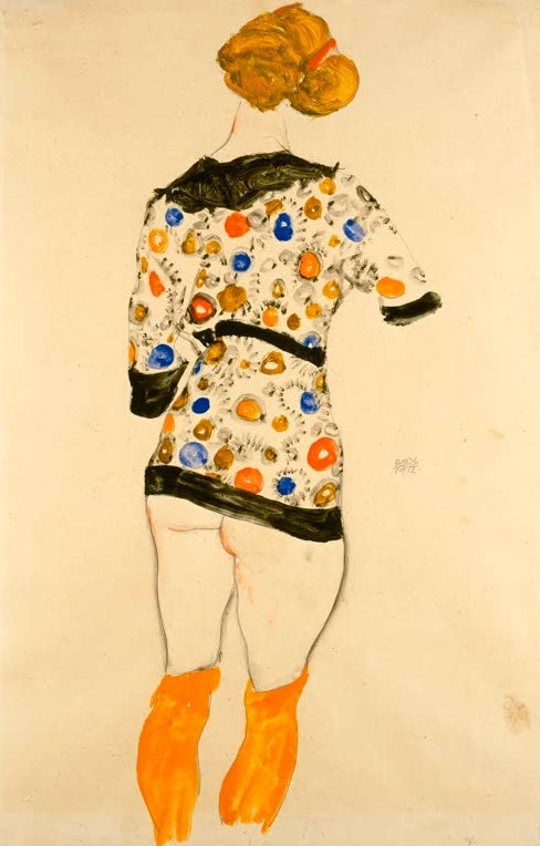 Frau von hinten in gepunkteter Bluse und orangen Strümpfen – Egon Schiele Stehende Frau in gemusterter Bluse Kunstkopie