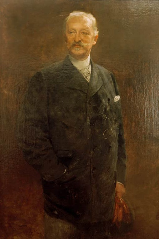 Älterer Herr mit Schnurrbart im dunklen Mantel vor braunem Grund – Ferdinand Brütt Porträt des Albert Baur Kunstkopie