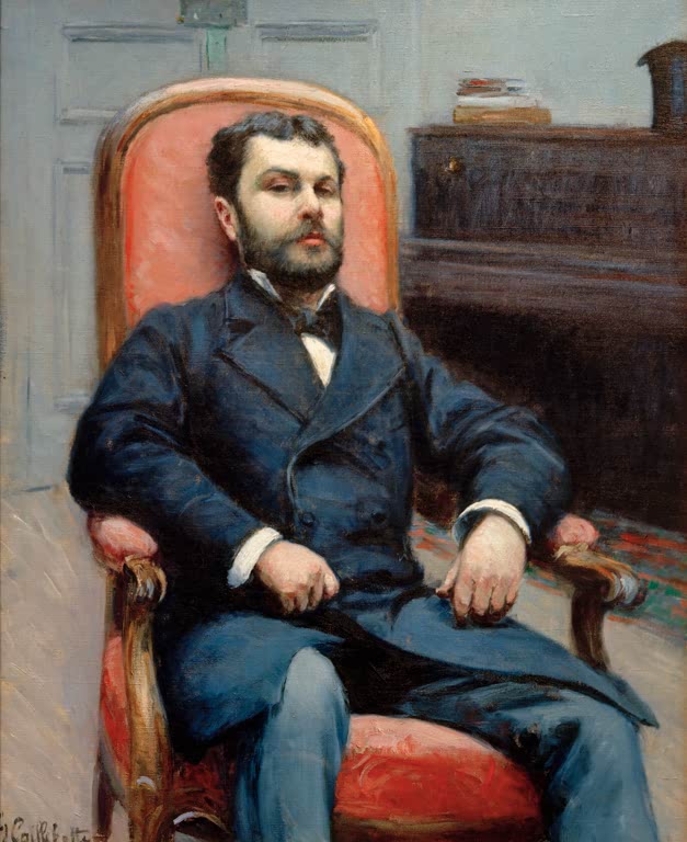 Bärtiger Mann im blauen Anzug im rosa Sessel, links Klavier – Gustave Caillebotte Portrait de Richard Gallo Kunstkopie