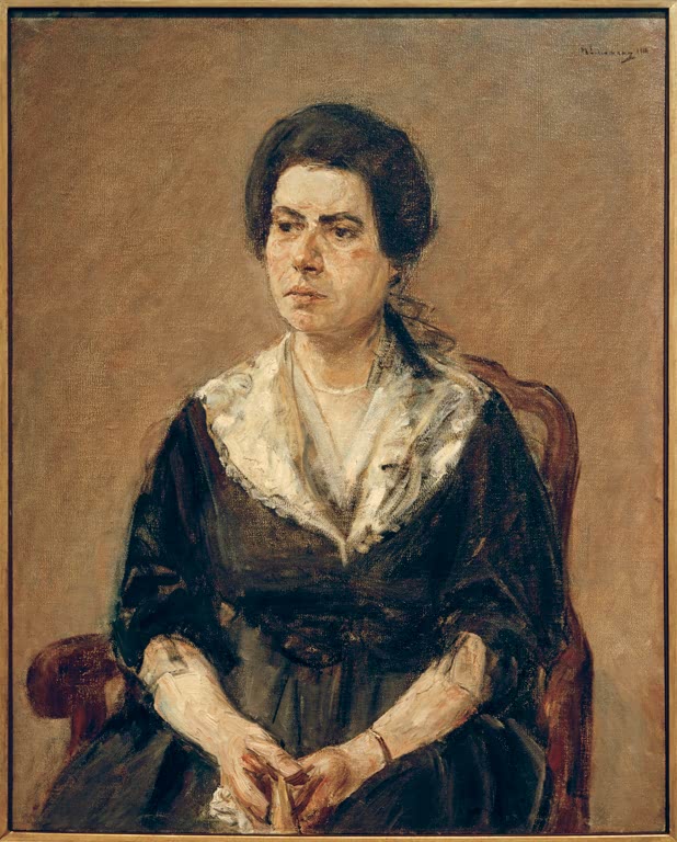 Sitzende Frau mit dunklem Haar und weißem Spitzenkragen im Lehnstuhl – Max Liebermann Bildnis Julie Elias Kunstkopie