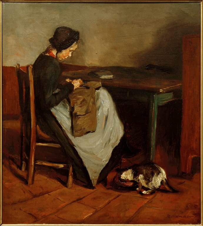 Nähendes Mädchen am Tisch mit Katze zu ihren Füßen in der Stube – Max Liebermann Nähendes Mädchen mit Katze Kunstkopie