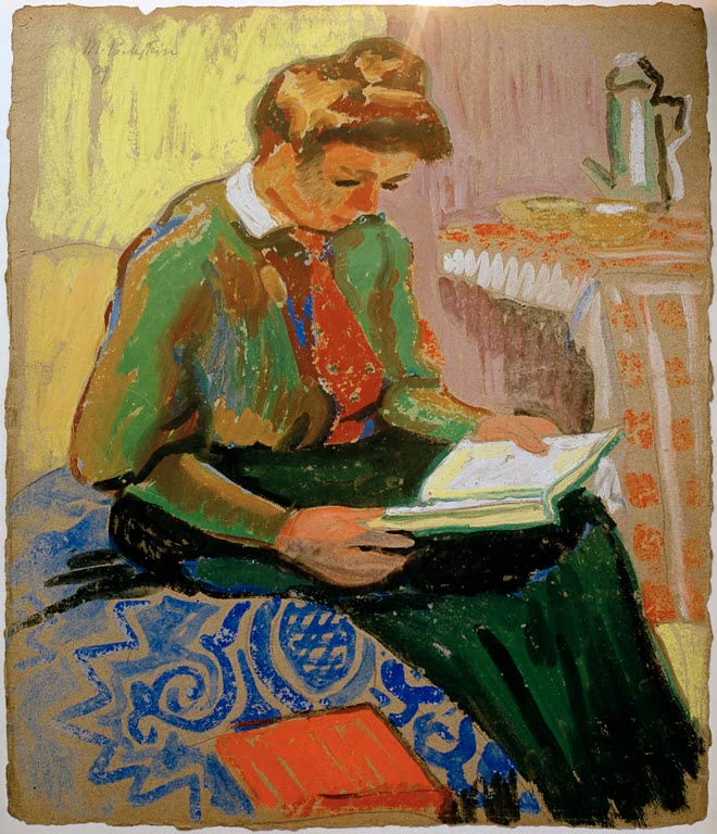 Lesende Frau in grüner Jacke sitzt auf einem gemusterten Polster – Max Pechstein Die Lesende Kunstkopie